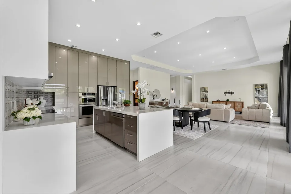Bright open-plan kitchen and living area with a large island
